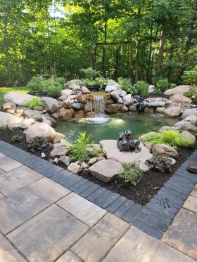 paver patio with water garden